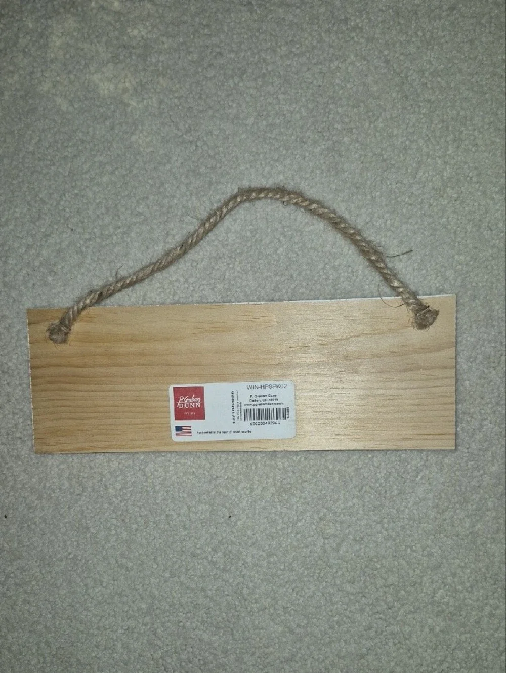 Ashland Neutral Wood 'This is Us' Wall Sign with Leaf Accents